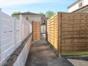 Appartements T2 - 28m2 avec cour et stationnement, wifi et linge fournis : photos des chambres