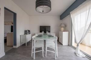 Appartements La douceur des vacances au bord de la mer : photos des chambres