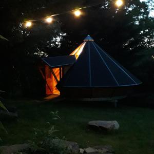 Tentes de luxe Tipis Du Petit Buisson : photos des chambres