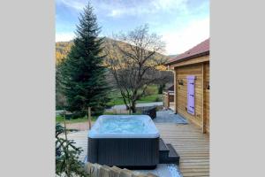 Chalets L'Elegance - SPA - Serviettes - Peignoirs - Lits faits - Menage inclus : photos des chambres