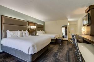 Queen Room with Two Queen Beds room in Club Hotel Nashville Inn & Suites