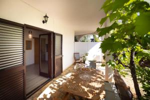 Apartments and a Room Ina 