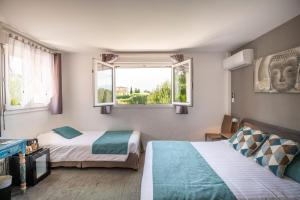 Hotels Les Bastides Saint Paul : photos des chambres