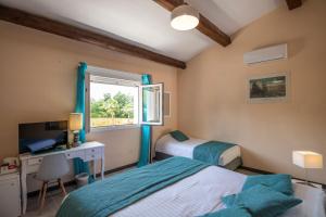 Hotels Les Bastides Saint Paul : photos des chambres