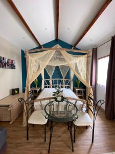 Maisons d'hotes Maisonnette et piscine : photos des chambres