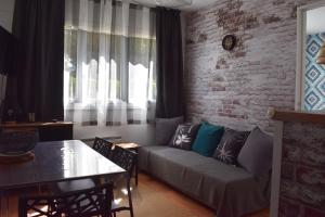 Appartement climatisé look industriel avec piscine à la plage