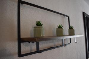 Appartement climatisé look industriel avec piscine à la plage