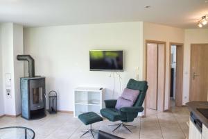 Ferienwohnung mit Kamin und Terrasse, gratis Nutzung vom AHOI Erlebnisbad und Sauna in Sellin - Villa Sara FeWo03