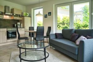 Ferienwohnung mit Kamin und Terrasse, gratis Nutzung vom AHOI Erlebnisbad und Sauna in Sellin - Villa Sara FeWo03