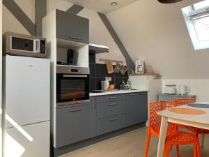 Appartements SUPERLOGIS - Sous Les Toits - T2 - BLOIS-HYPERCENTRE 1 chambre 4 personnes : photos des chambres