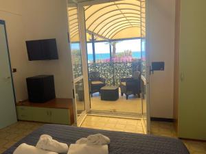 Double Room with Balcony room in Caravella