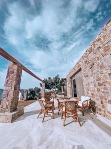 Stone built house next to the beach Ammouliani Greece