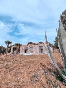 Stone built house next to the beach Ammouliani Greece