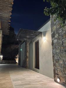 Stone built house next to the beach Ammouliani Greece