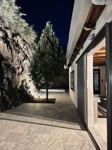 Stone built house next to the beach Ammouliani Greece