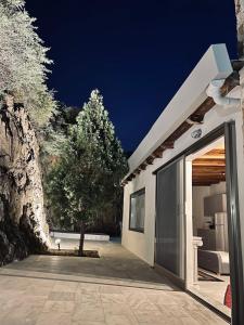 Stone built house next to the beach Ammouliani Greece