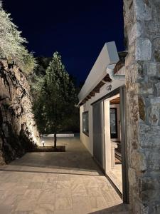 Stone built house next to the beach Ammouliani Greece