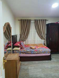 Two-Bedroom Apartment room in شقه-1-بجوار صن سيتى مول