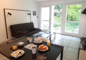 Appartements La Poterie - Appartement avec balcon et parking prive : photos des chambres