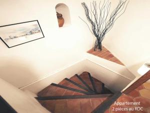 Appartements Le rocher : photos des chambres