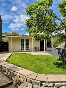 Apple tree hut, in a private garden
