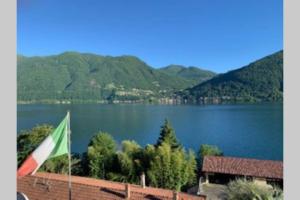 Cosy Penthouse with stunning view on Lugano Lake