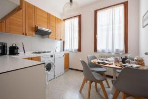 Ca’ Pesaro rooftop terrace apartment.