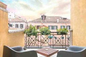 Ca’ Pesaro rooftop terrace apartment.