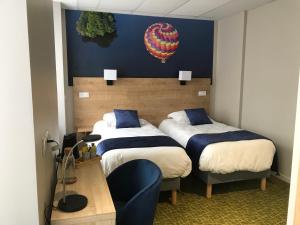 Hotels Logis Hotel de Paris : photos des chambres