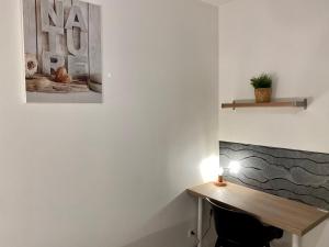 Appartements LE VICTOR HUGO - Wifi - Centre ville - PROPERTY RENTAL NM : photos des chambres