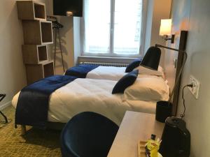 Hotels Logis Hotel de Paris : photos des chambres