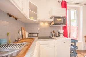 Appartements La Roseraie : photos des chambres