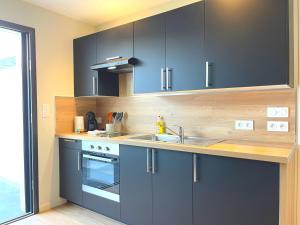 Appartements Studios Neufs -Tout Confort - Lorient Centre - Stationnement Facile : photos des chambres