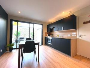 Appartements Studios Neufs -Tout Confort - Lorient Centre - Stationnement Facile : photos des chambres