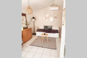 Appartements le Studio charme et tranquillite : photos des chambres