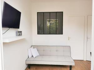 Appartements Joli appartement a 2 pas de Paris : photos des chambres