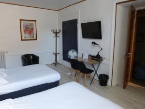 Hotels Hotel des Alpes : photos des chambres