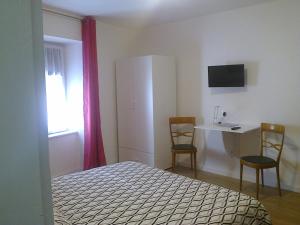 Quadruple Room with Private Bathroom