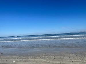 Jackie’s 3 bedroomed secure beach front apartment Strand Golden Mile