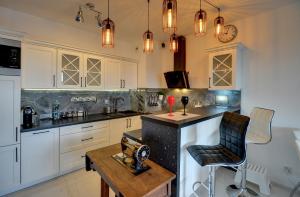 Lodz4rent - Premium Apartments 9,7 - MANUFAKTURA - Garaż - Ziemia Obiecana 2025