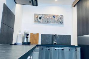 Appartements Studio « L’anthracite ». : photos des chambres