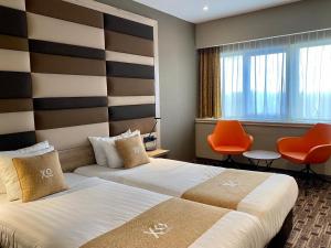 Standard Twin Room room in XO Hotels Blue Tower