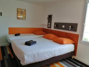 Hotels Kyriad Direct Saintes : photos des chambres