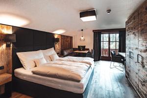 Junior Suite with Garden View room in Hotel Chalets Grosslehen