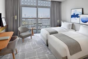 Partial Marina View Deluxe Room Twin - Free Shuttle to Dubai Mall & La Mer Beach room in Vida Creek Harbour