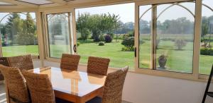 Gîte "Au Ptit Tourois" de plain-pied tout confort avec véranda proche dOmaha Beach et de Bayeux accueillant les animaux