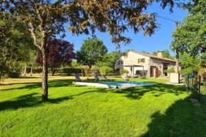 Maisons de vacances Gite de charme piscine privee chauffee climatise wifi aux portes du Perigord entre Villereal et Monpazier : photos des chambres