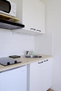 Appartements Studio Belle vue Bordeaux - Parking prive - Netflix - Tram A : photos des chambres
