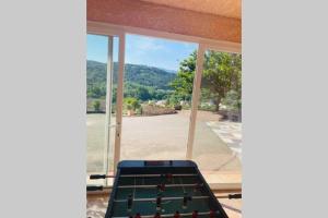 Maisons de vacances Charmante maison avec jacuzzi : photos des chambres