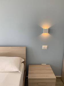 Appartamento fronte mare con giardino